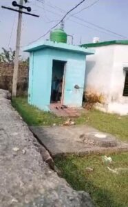 school children cleaning toilet